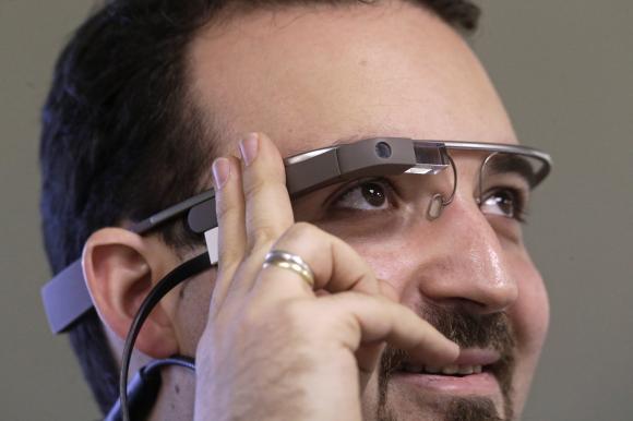 Developer Firtman wears Google Glass before news conference in Riga